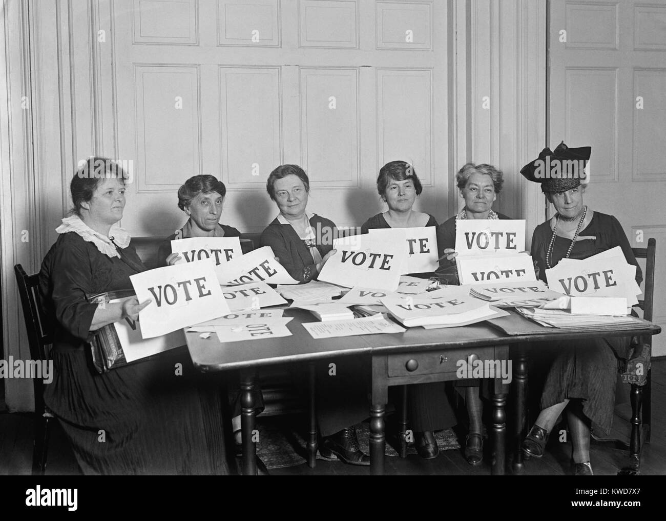 National League of Women Voters hold up signs reading, 'VOTE', Sept. 17, 1924. Millions of women voted in 1920 and 1924, but in a lower proportion than men. (BSLOC 2015 16 192) Stock Photo