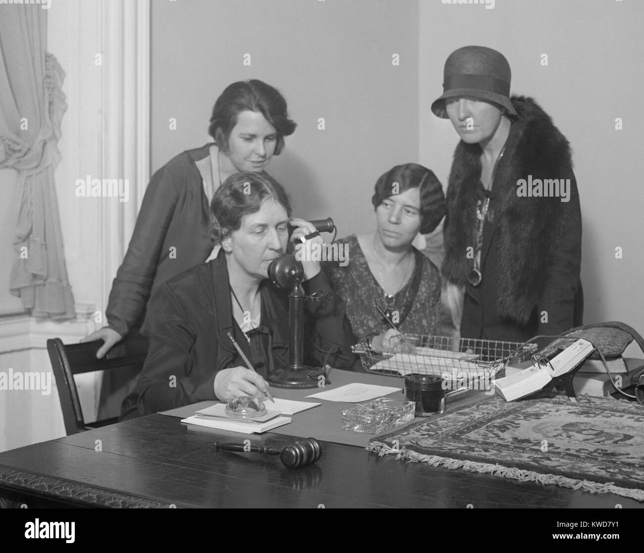 National Woman's Party telephoned the 1930 World Conference in the Hague. April 3, 1930. L-R: Anna Kelton Wiley; Alice Paul; and Elsie Hill. They were concerned that the ongoing the codification of international law would elevate the legal rights of women. (BSLOC 2015 16 207) Stock Photo