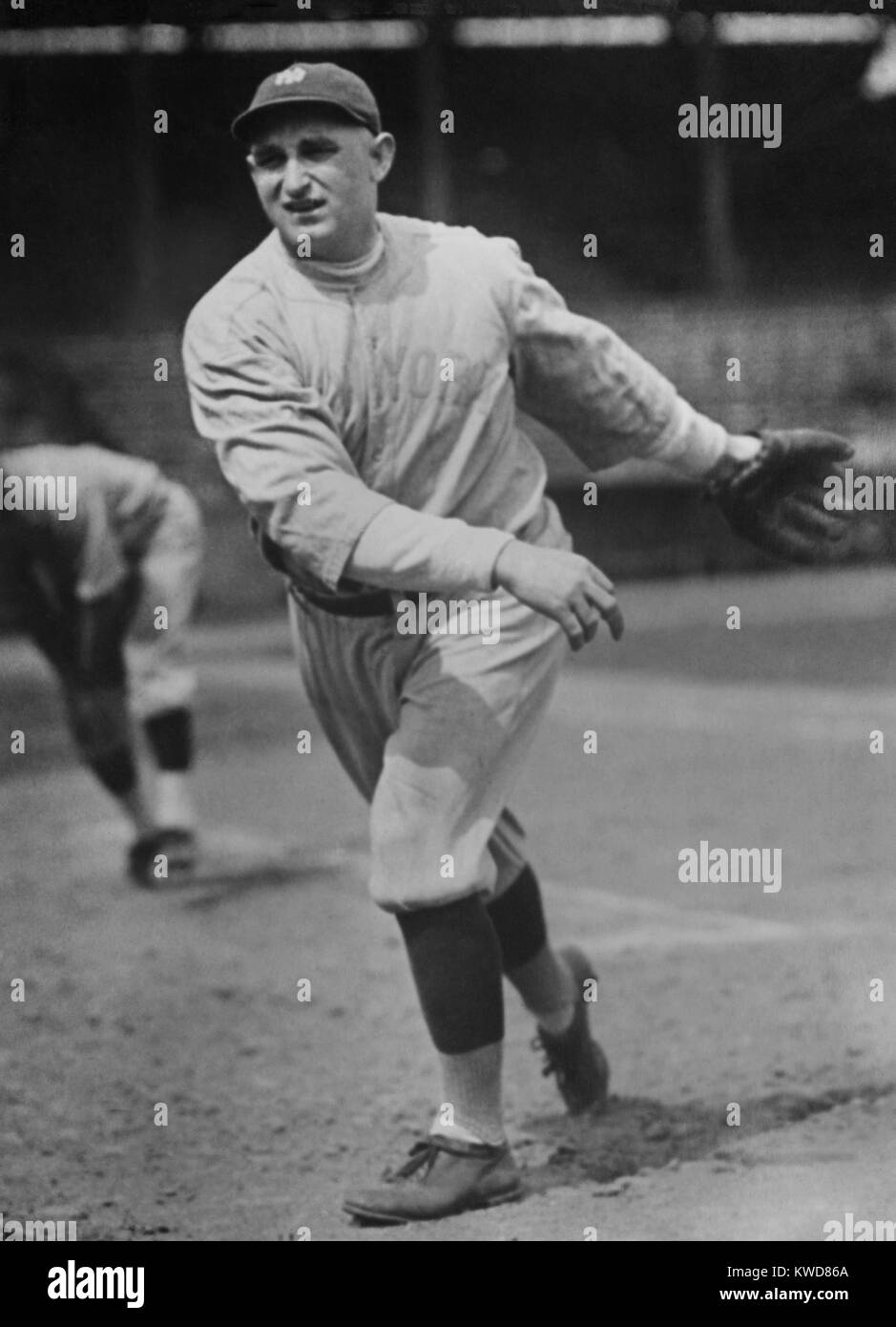 New York Yankees pitcher Carl Mays on the mound in 1922. In 1920, he threw a 'submarine' pitch that beaned and killed Cleveland Indians' Ray Chapman. It was the first fatal player injury during a major league baseball game. (BSLOC 2015 17 12) Stock Photo