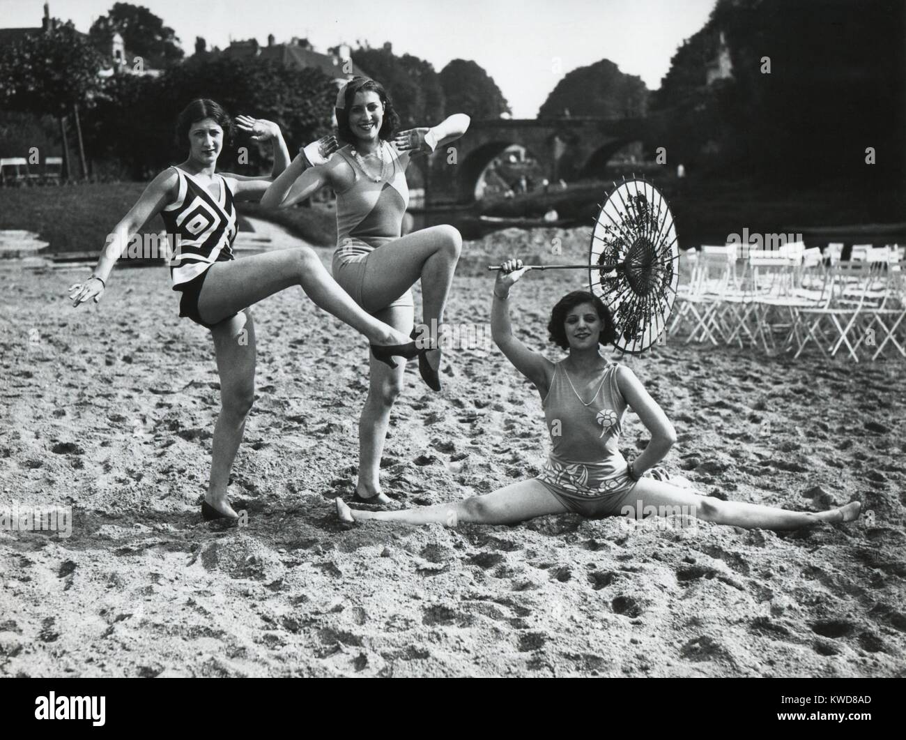 Acrobatic French women pose in the latest fashionable bathing suits on the  sand beach at Dieppe. Ca. 1925. (BSLOC 2015 17 202 Stock Photo - Alamy