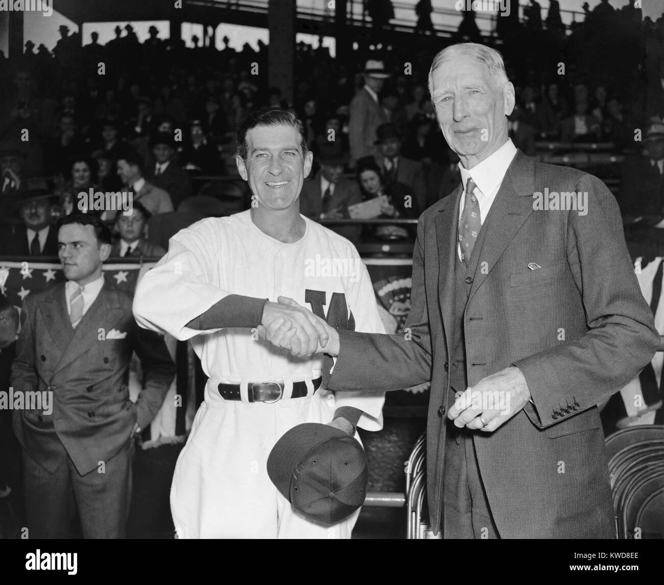 Baseball Managers Bucky Harris (left) and Connie Mack, April 18, 1938. They were at the season opener at Griffith Stadium between the Washington Senators and Mack's Philadelphia Athletics. (BSLOC 2015 17 51) Stock Photo