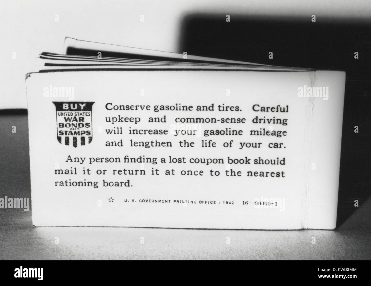 World War 2 gasoline rationing booklet for one year's consumption. From 1942-1946 U.S. government also rationed other commodities such as heating oil, metals, rubber, paper, and plastics (BSLOC 2016 7 24) Stock Photo