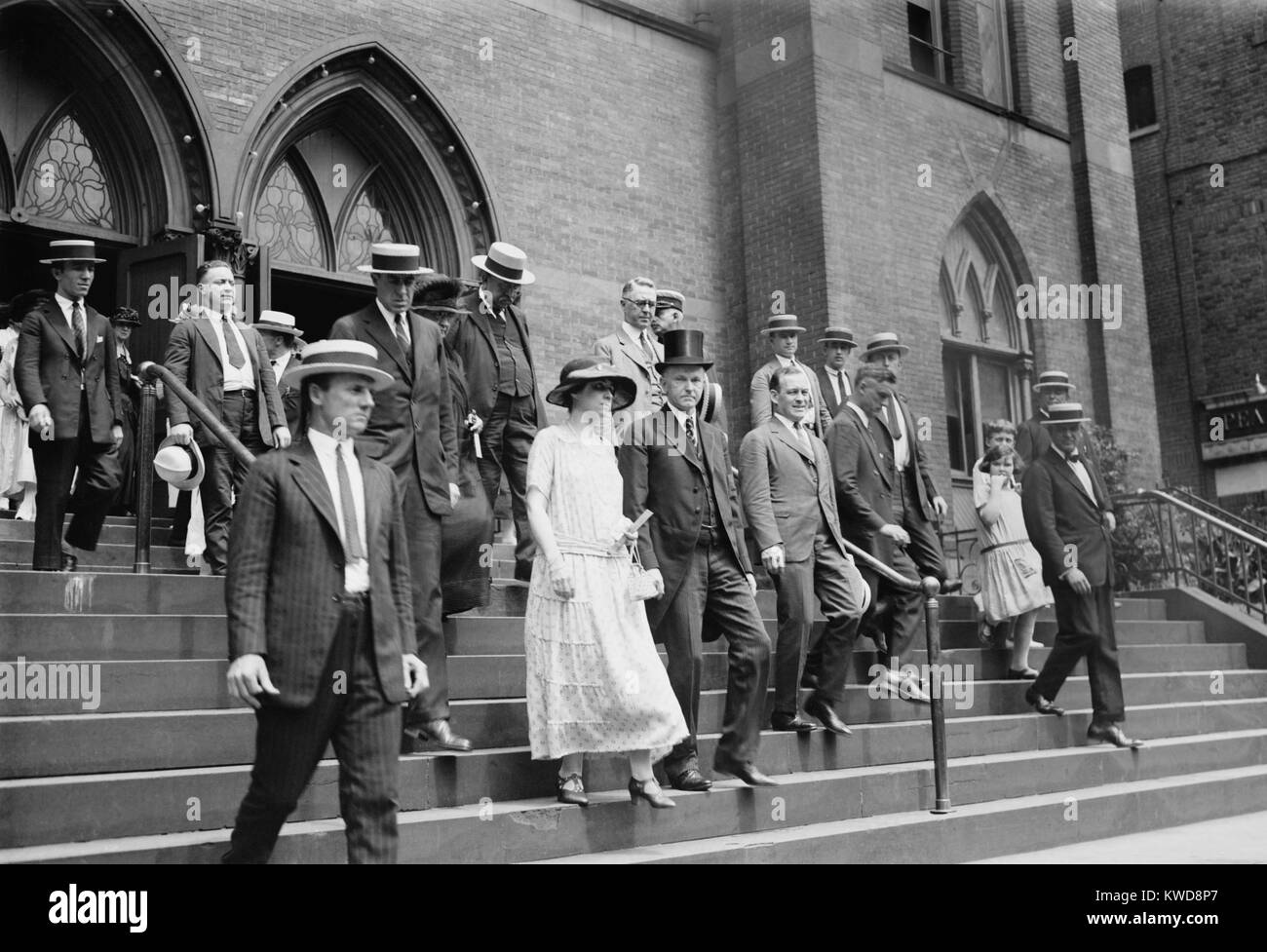 President Calvin Coolidge and First Lady Grace Coolidge leaving church on Aug. 5, 1923. It was the first Sunday after the death of President Warren Harding three days earlier. (BSLOC 2015 16 17) Stock Photo