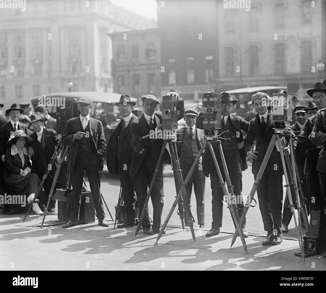 Cameramen in Washington, D.C., waiting to shoot motion pictures for the newsreels, 1920 (BSLOC 2016 8 154) Stock Photo