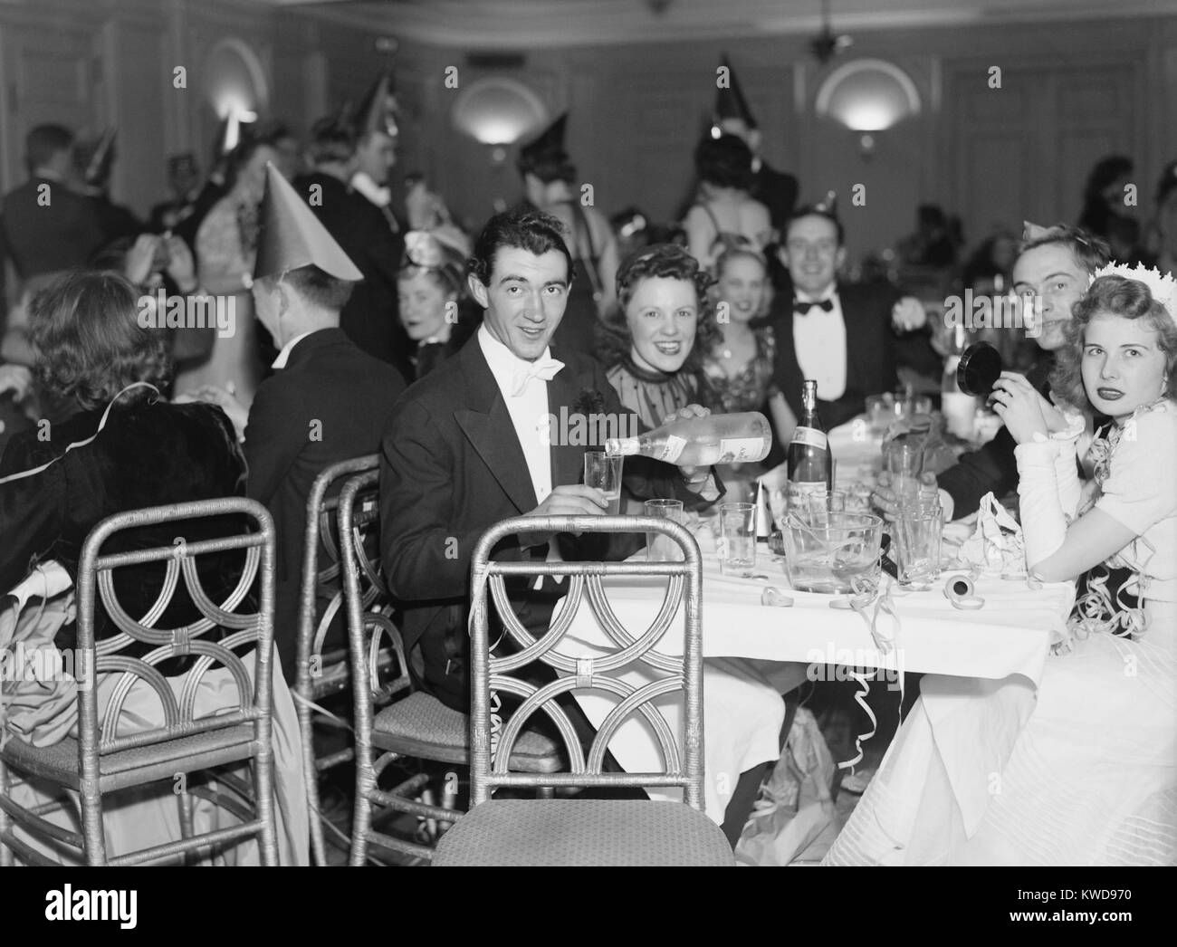 Happy revelers celebrating New Year's Eve in 1940 in Washington, D.C. (BSLOC 2016 8 92) Stock Photo