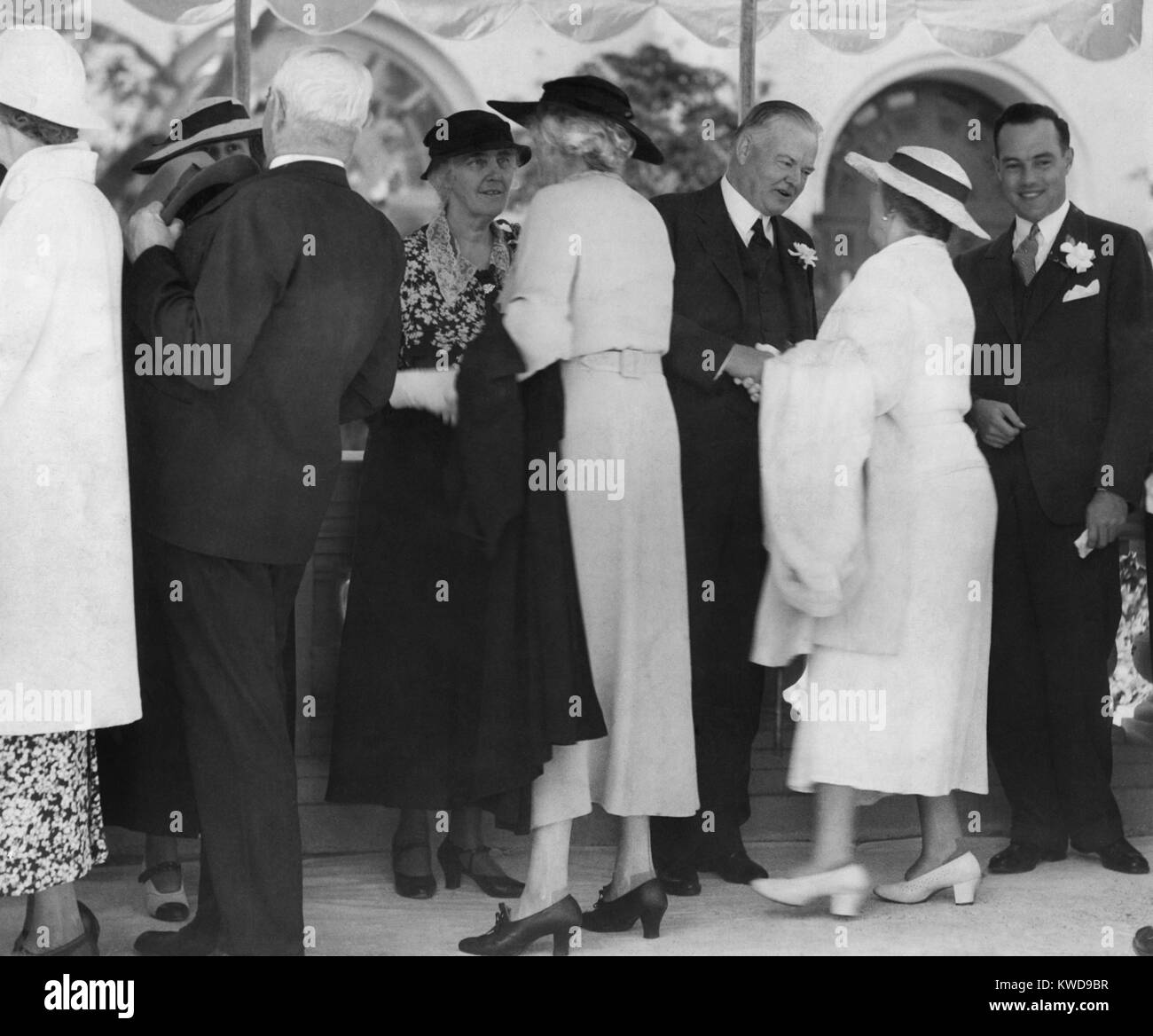 Former President Herbert Hoover and Lou Hoover receiving guests at San
