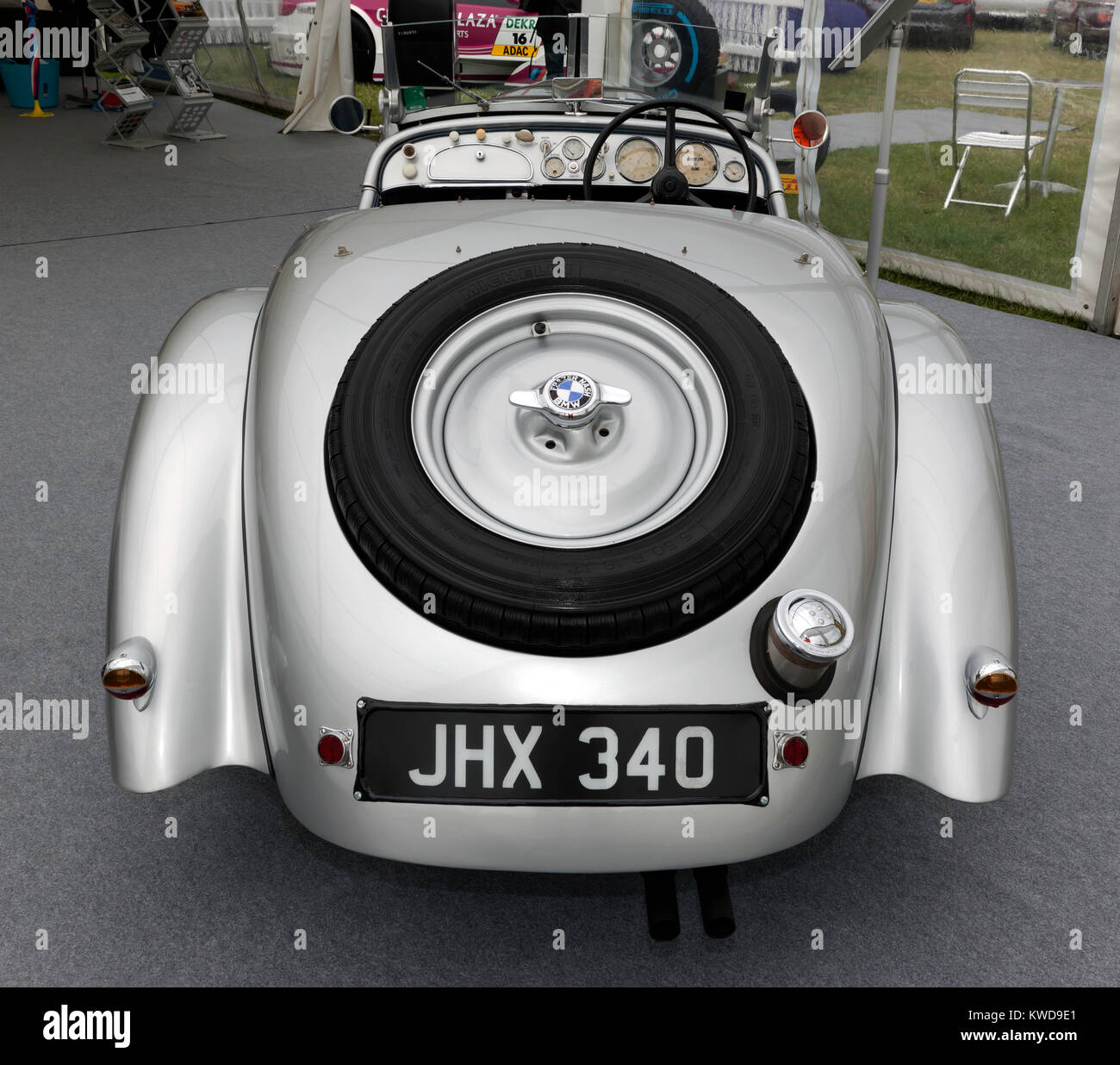 Rear view of a  1933, Silver BMW 328  on static display in the BMW Car Club of great britian Ltd zone of the Silverstone Classic 2017 Stock Photo