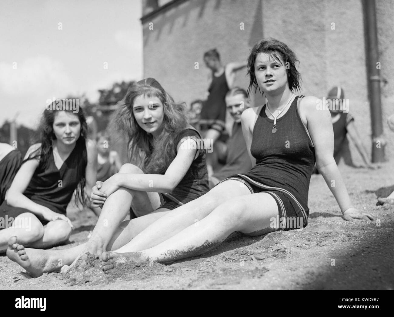 Three young women in bathing suits on sandy beach at the Tidal Basin, Washington, D.C. Ca. 1925. (BSLOC 2015 17 199) Stock Photo