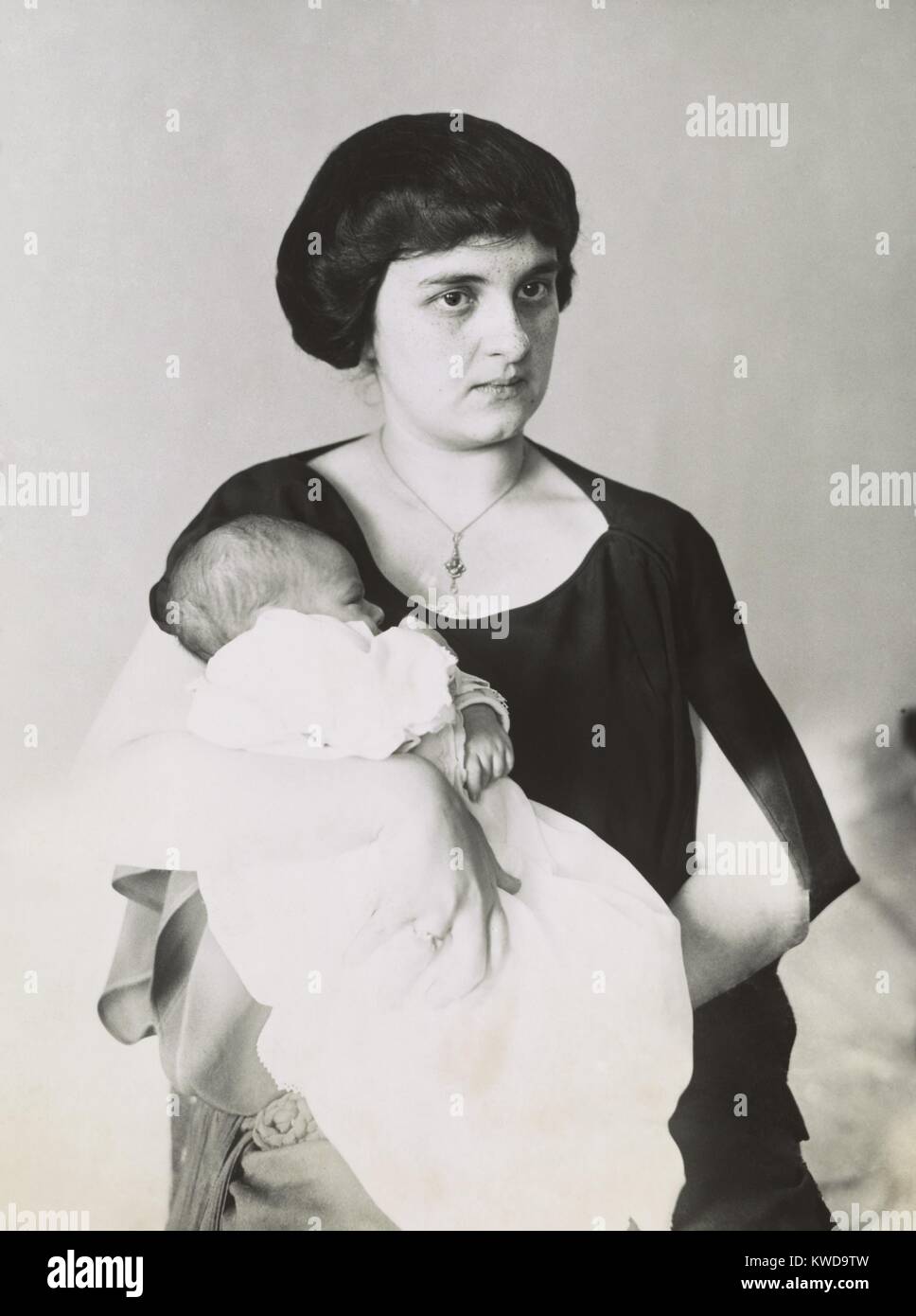 Mrs. Mary Creighton with her baby born between her arrest in and before her ensuing acquittal in Newark, 1923. She and her husband John were tried for the poison-murder of her mother-in-law. She was also tried from the poison murder of her consumptive brother, Raymond Every (BSLOC 2016 10 77) Stock Photo