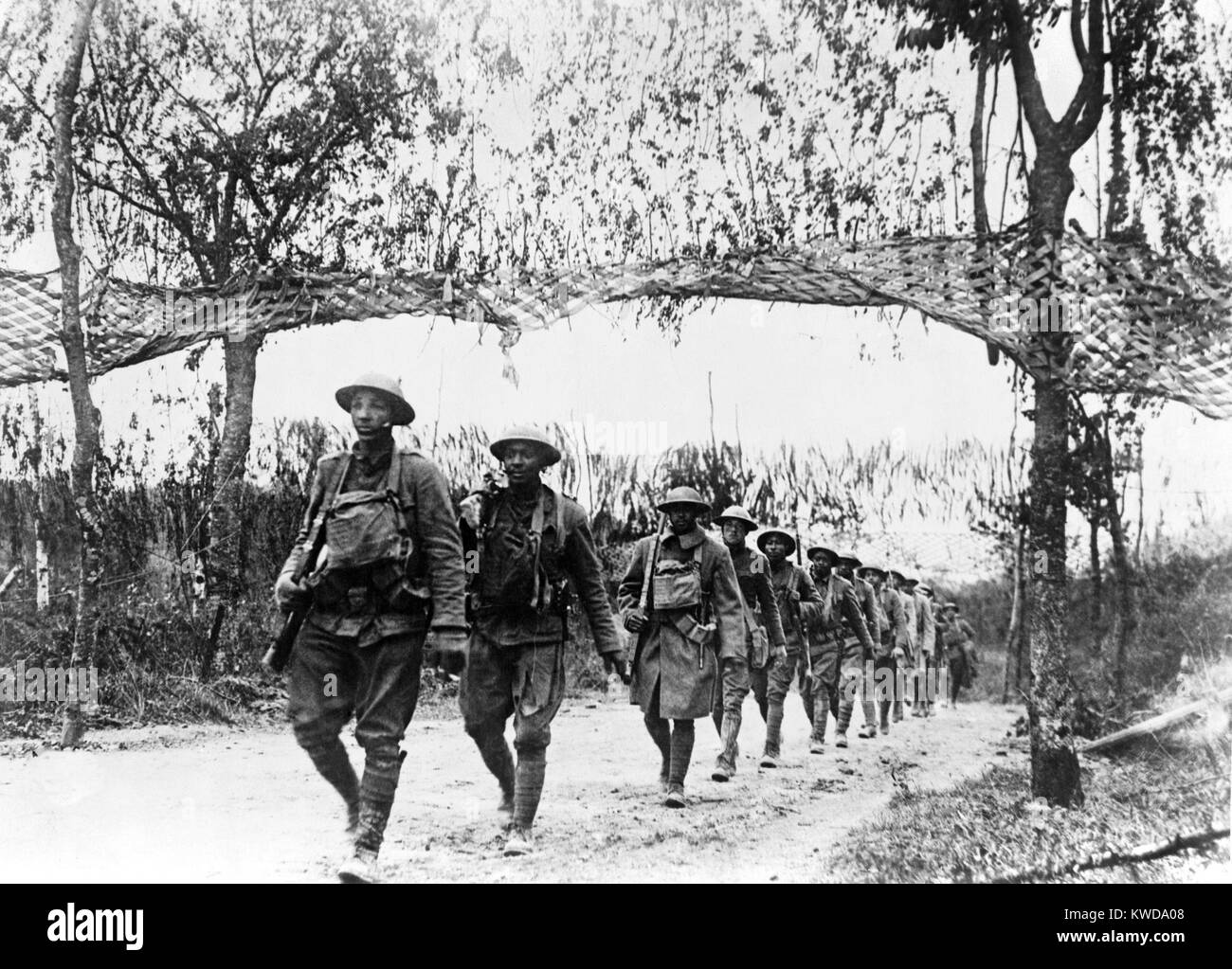 World War 1. U.S. Army infantry troops from an African American unit marching northwest of Verdun, France. Ca. 1918. (BSLOC 2013 1 110) Stock Photo