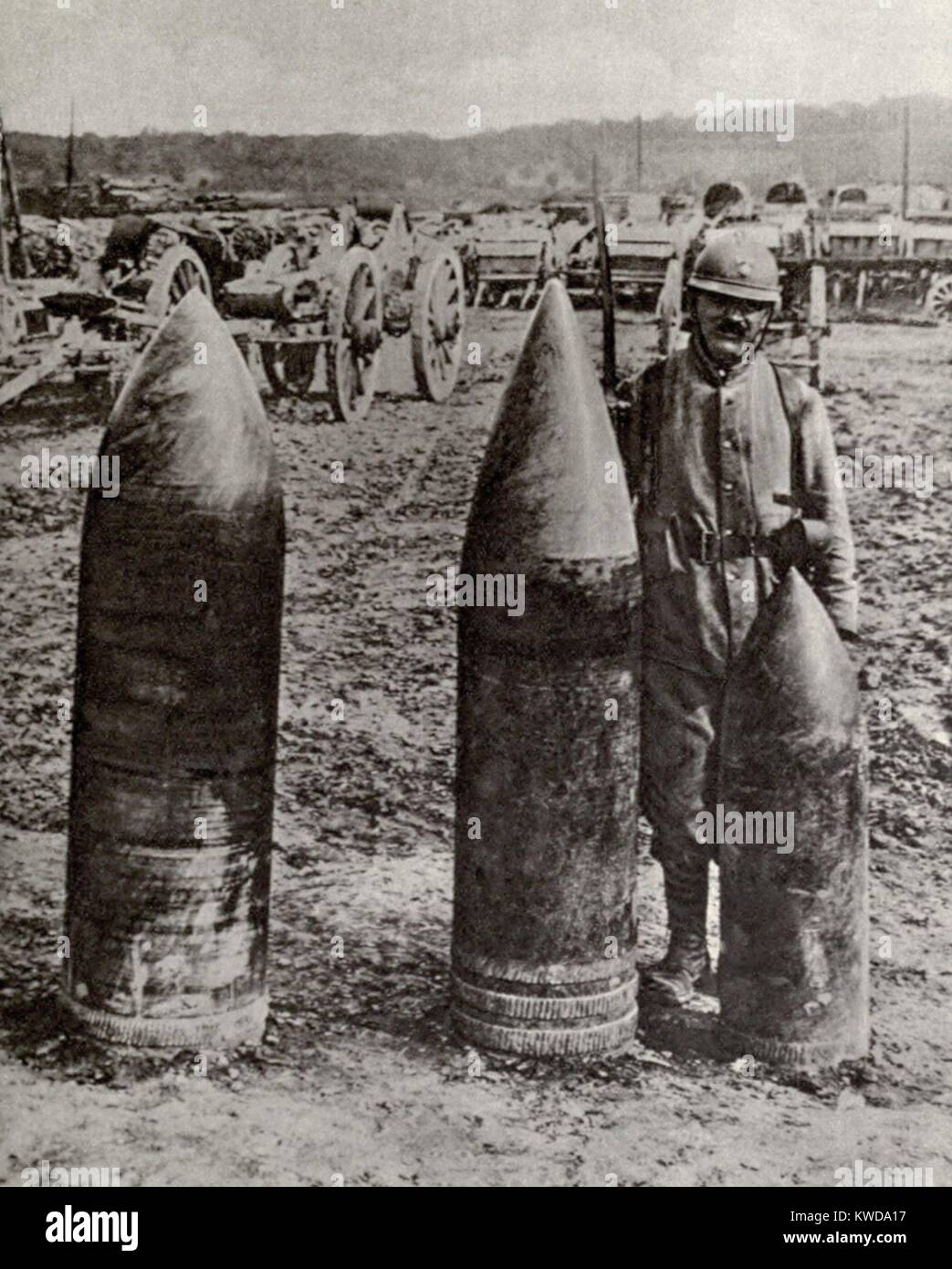World War 1. French heavy gun, or howitzer, high explosive projectiles, L to R: a 420-mm (16.5 inch) shell, weight 2350 lb.; a 360-mm (14 inch) shell, weight 1400 lb.; and a 305 mm (12 inch) shell, weight 850 lb. (BSLOC 2013 1 121) Stock Photo