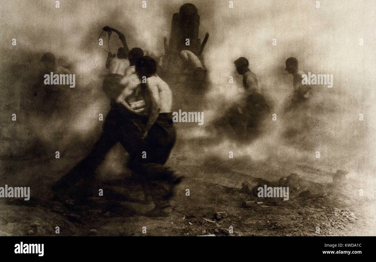 World War 1. British gunners, stripped to the waist serving one of their monster guns during the Battle of the Hindenburg Line, Sept. 12 through Oct. 12, 1918. (BSLOC 2013 1 124) Stock Photo