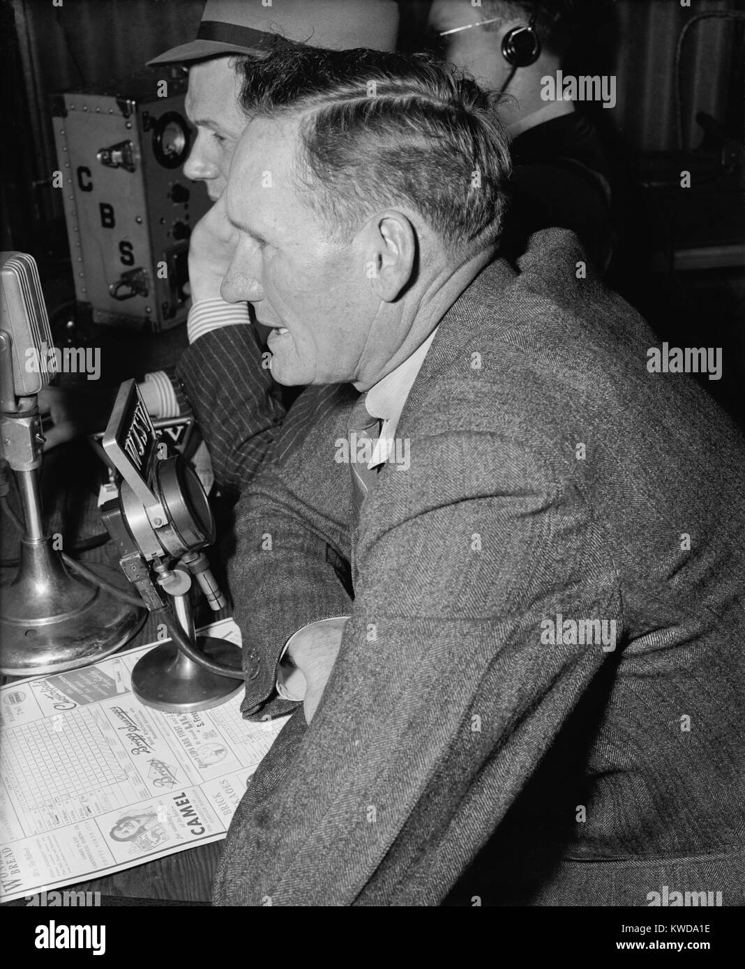 Retired baseball star Walter Johnson calling the play by play at Washington's CBS station, WJSV, April 22, 1939. (BSLOC 2015 17 41) Stock Photo