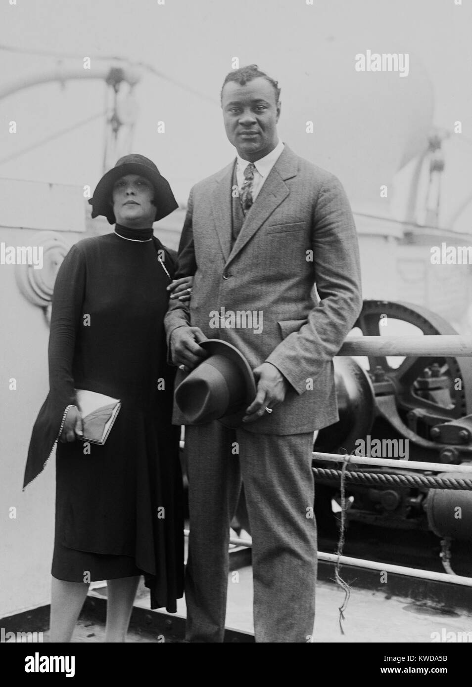 African American heavyweight Boxer Harry Wills and his wife, ca. 1925. Wills was ranked as the number one challenger for the championship. In the 1920s, many white fighters refused to fight Blacks. Jack Dempsey and Wills signed a contract for a 1926 the bout, but the finances collapsed, canceling the fight. (BSLOC 2015 17 82) Stock Photo
