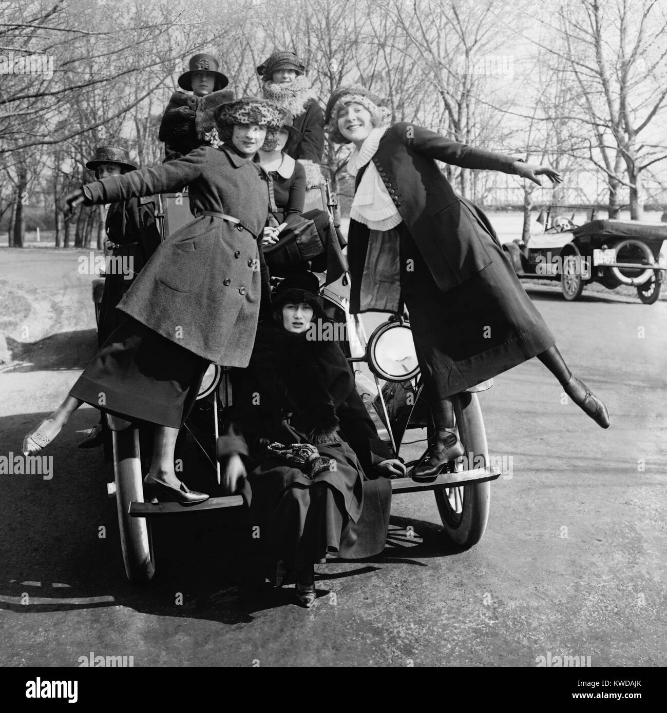 Greenwich Village Girls, an entertainment troupe, pose on a car for Lanza Motor Car Company. Washington, D.C. ca. 1920 (BSLOC 2016 10 131) Stock Photo