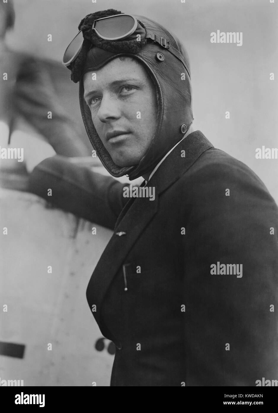 Charles Lindbergh, after flying his monoplane, 'The Spirit of Saint Louis', to New Jersey. Oct. 19, 1927. He wears a fleece lined leather flight helmet and goggles (BSLOC 2016 10 151) Stock Photo