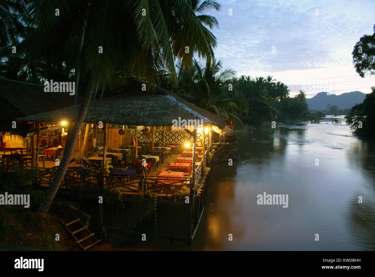 Restaurant on the river Mekong, South Laos Stock Photo