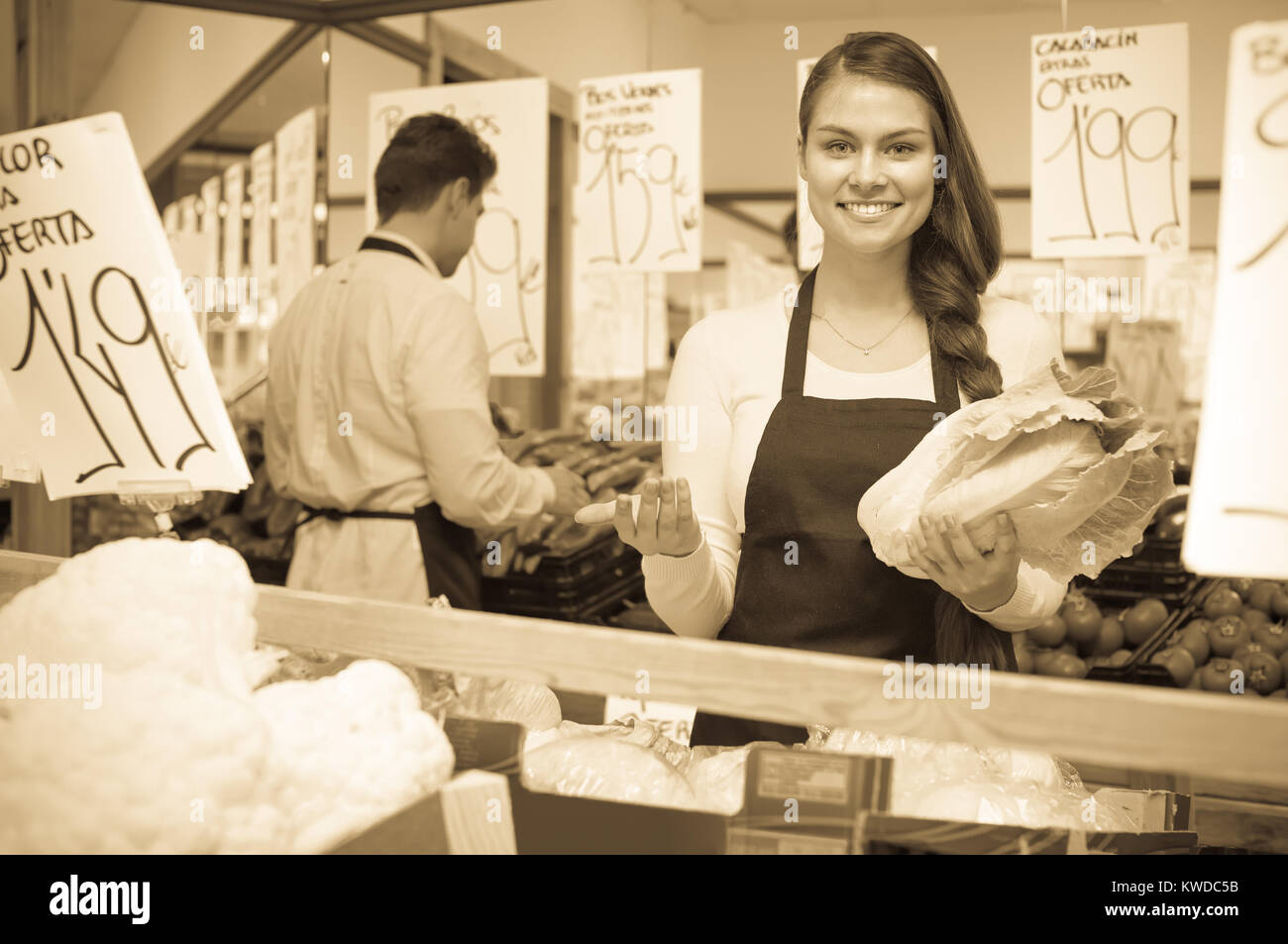 Seller With Lettuce And Cabbage In Market Prices On Spanish Stock Photo Alamy