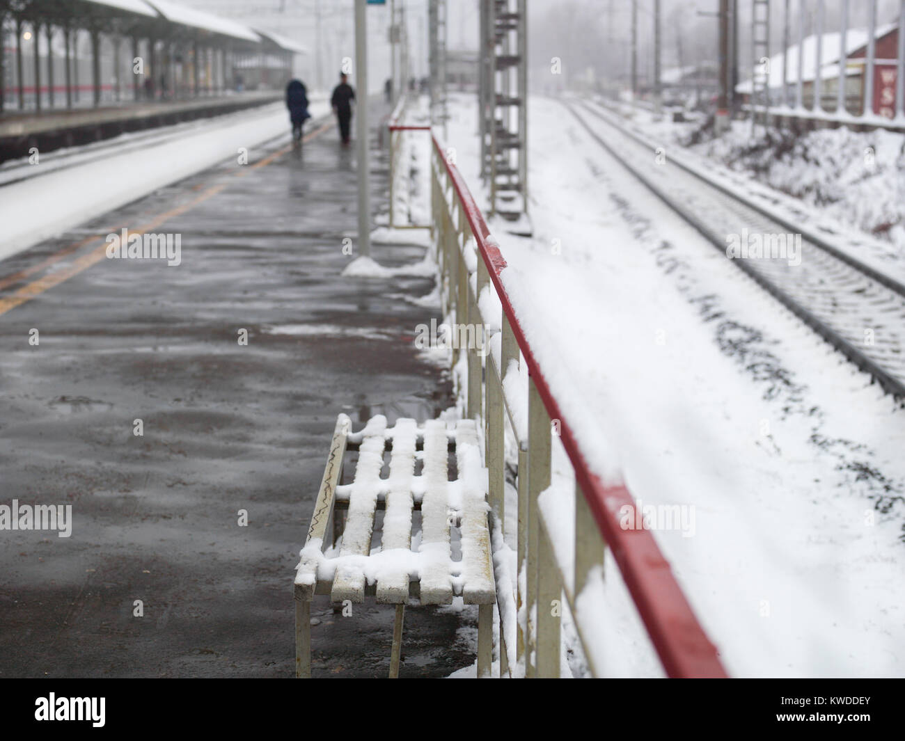 Waiting for train in snow hi-res stock photography and images - Alamy