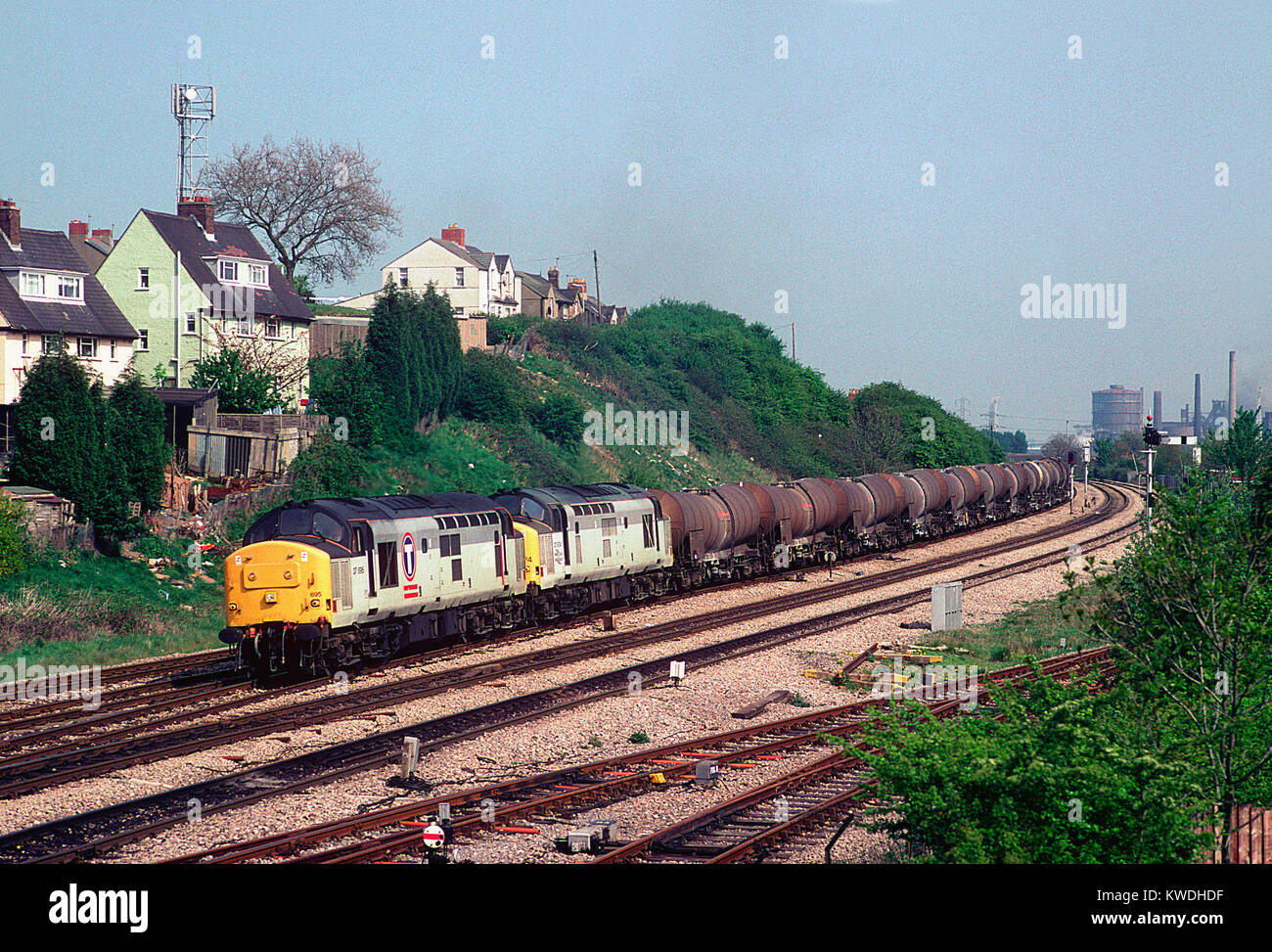 A pair of class 37 diesel locomotives numbers 37695 and 37674 working a train of china clay tanks at East Usk Junction in South Wales. 27th May 1995. Stock Photo