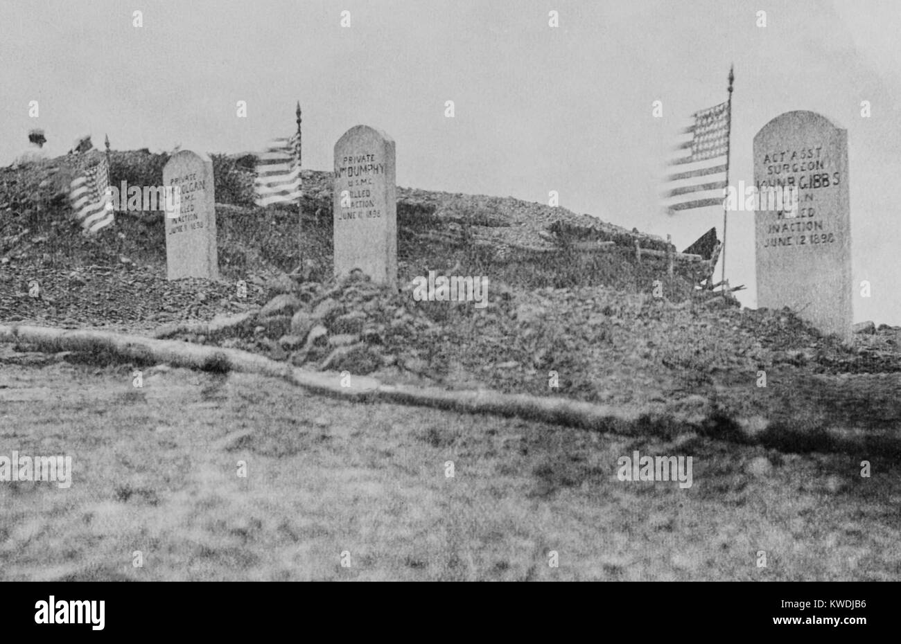 Graves of three of the six Marines killed in the Battle of Camp McCalla at Guantanamo, June 14, 1898. Two pickets on outpost duty, Privates William Dumphy and James McCol were the first killed. Acting Assistant Surgeon John Blair Gibbs was killed in an evening firefight in which artillery and machine gun fire was used to defend the American encampment (BSLOC 2017 10 21) Stock Photo
