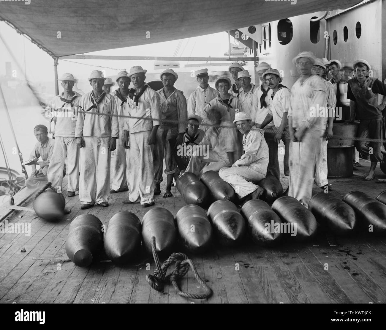 Crew of the USS Texas, posing with ammunition. During the Battle of Santiago on July 3, 1898, the battleships shelled and disabled the Spanish cruisers Vizcaya and Cristobal Colon (BSLOC_2017_10_50) Stock Photo