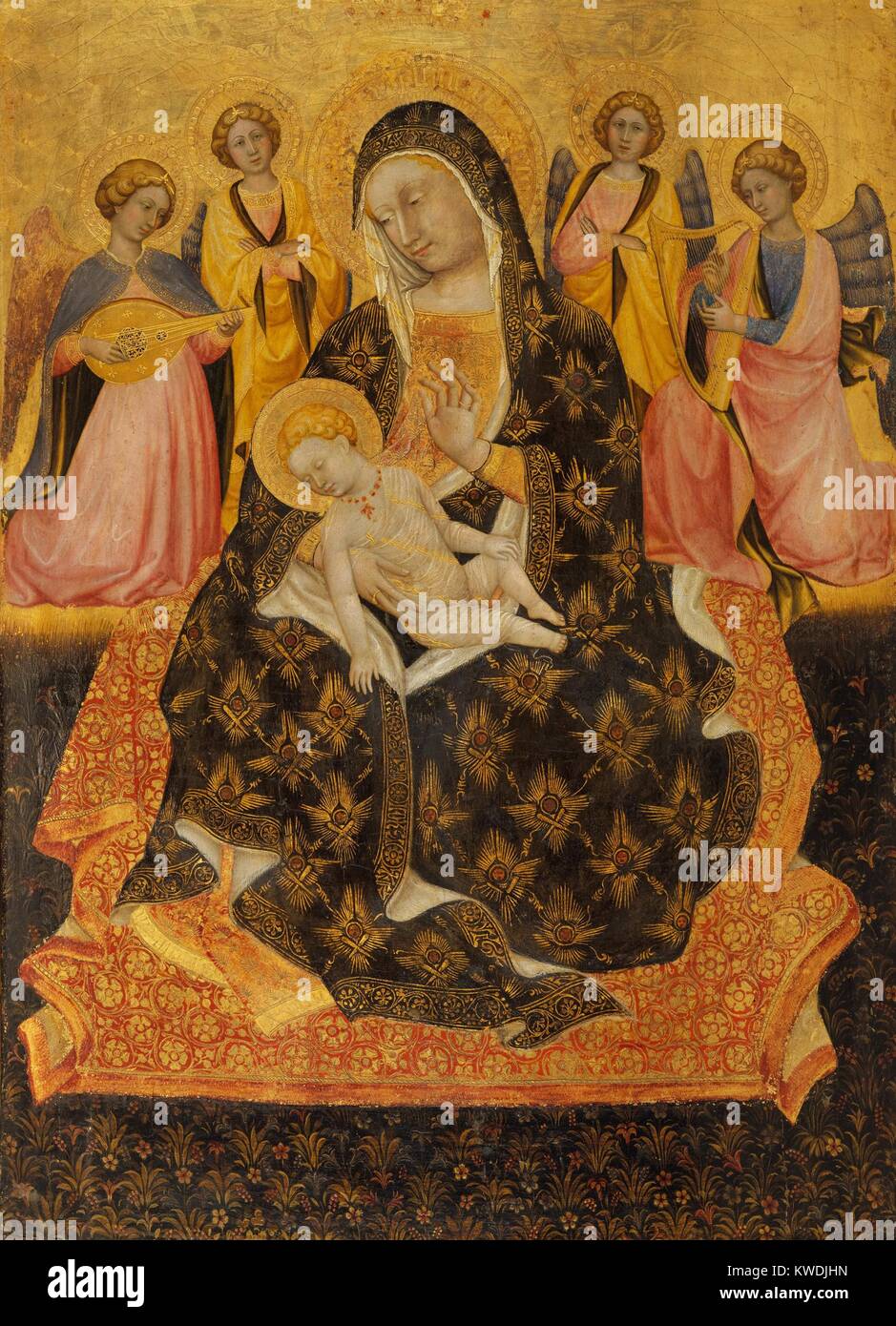 MADONNA AND CHILD WITH ANGELS, by Pietro di Domenico da Montepulciano, 1420, Italian Renaissance painting. This stylistically conservative work employs flat medieval decorative elements. The Madonna is depicted as the Queen of Heaven, who sits on the ground, as angels in the background playing musical instruments (BSLOC 2017 16 35) Stock Photo