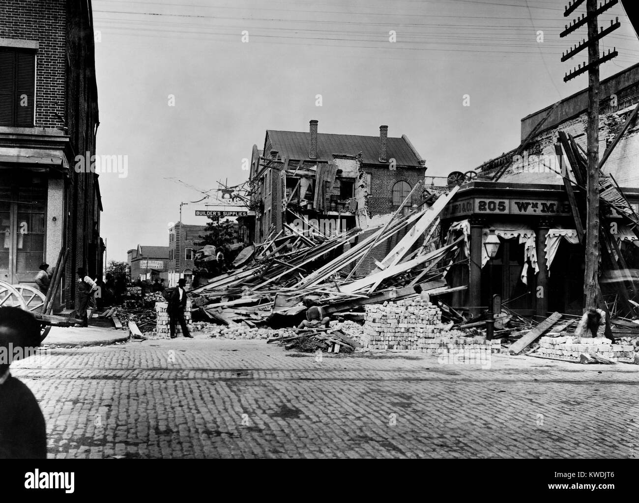 Destruction on East Bay and Cumberland Street, Charleston, after the earthquake of August 31, 1886. William Bird Company building was called the worse wreck in the city. Photo by John K. Hillers (BSLOC 2017 17 57) Stock Photo
