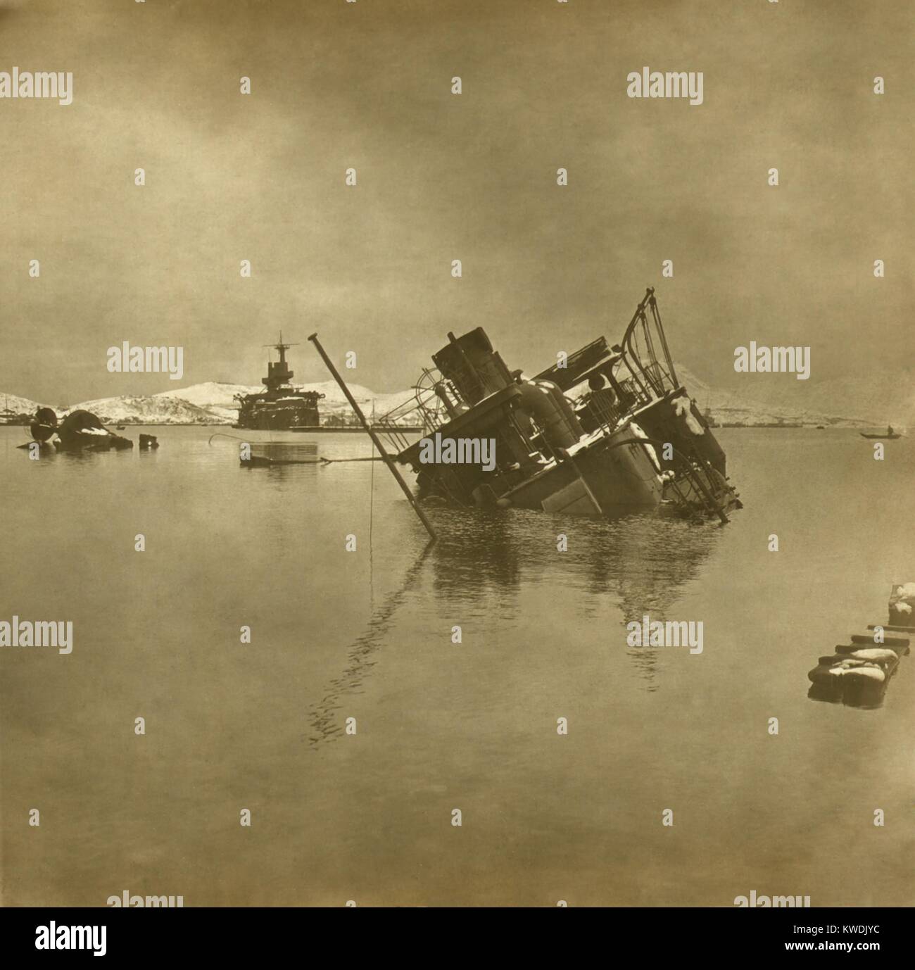Sunken Russian warships, in Port Arthur Harbor, during the Russo Japanese War, Dec. 1904. Japanese 11-inch howitzer siege guns destroyed the blockaded ships. (BSLOC 2017 18 106) Stock Photo