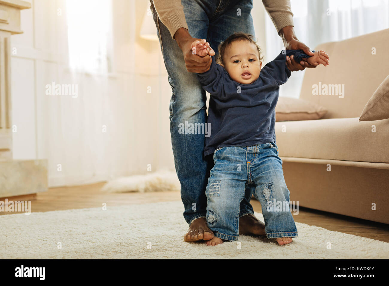 Sweet child learning to walk stock photo alamy