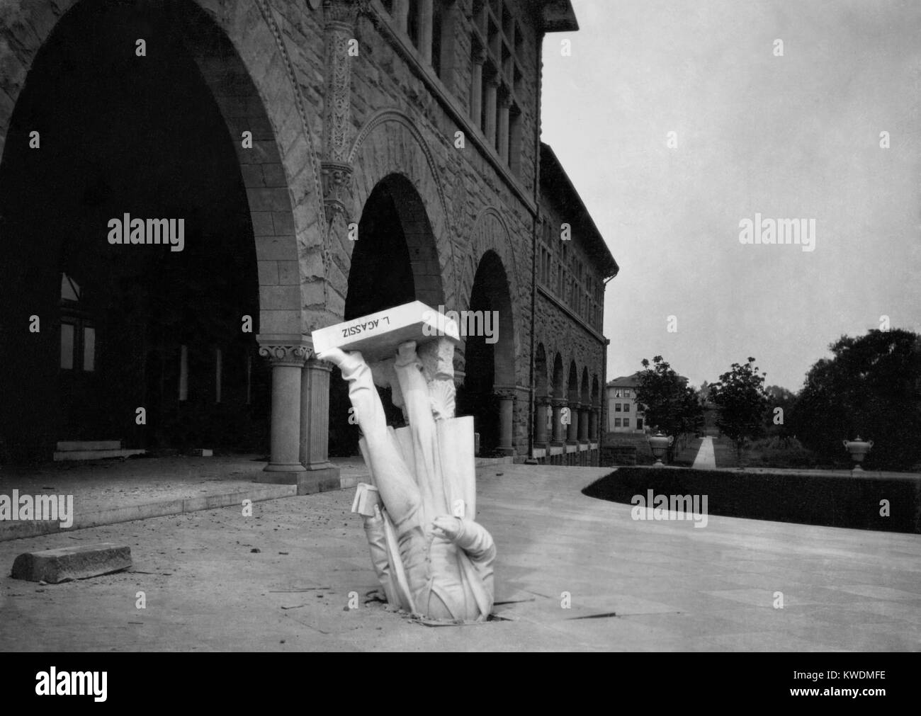 Statue of Louis Agassiz in pavement after the San Francisco Earthquake, 1906. It fell from the Zoology building at Stanford University, and landed with the head embedded in the sidewalk. Humor was found in the quote, Agassiz was great in the abstract, but not in the concrete (BSLOC 2017 17 6) Stock Photo