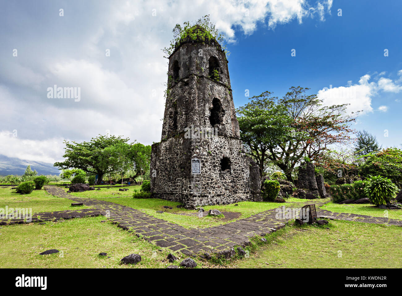 Cagsawa Ruins are the remnants of an 18th century Franciscan church, built in 1724 and destroyed by the 1814 eruption of the Mayon Volcano. Stock Photo