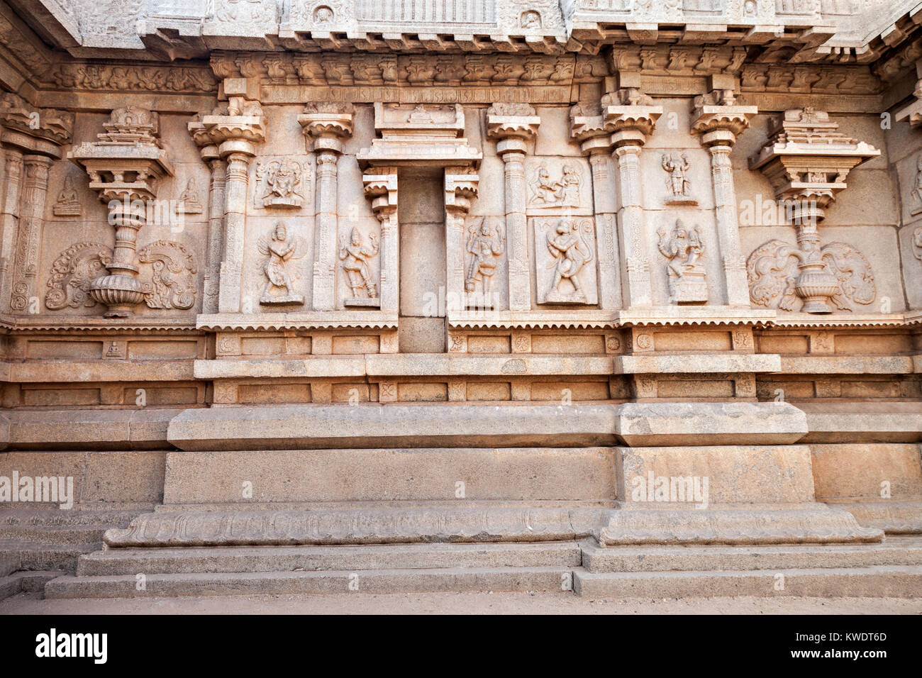 Hindu temple wall with ornate carving, Asia Stock Photo
