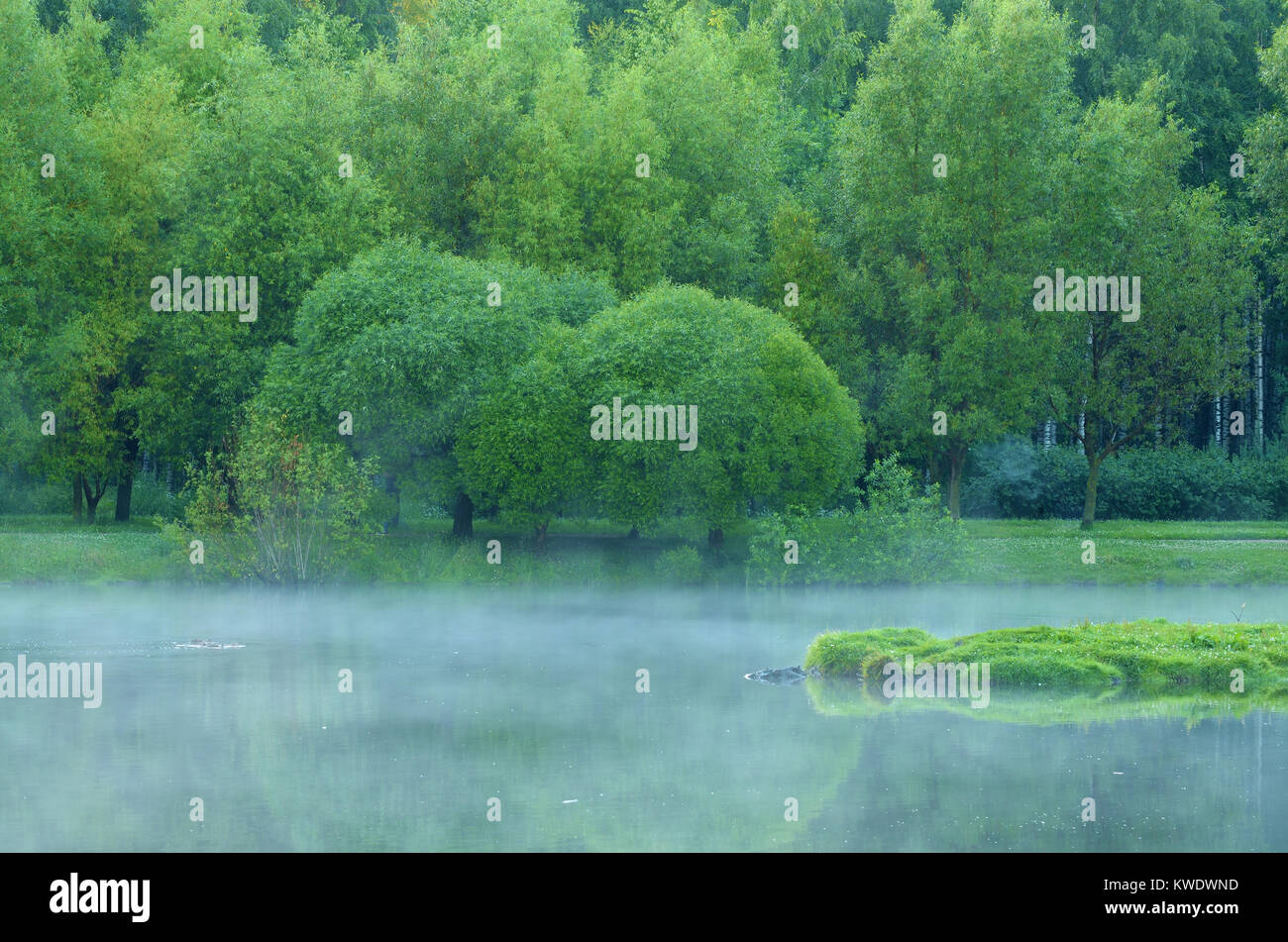 After night fell, began to evaporate the water in the lake Stock Photo