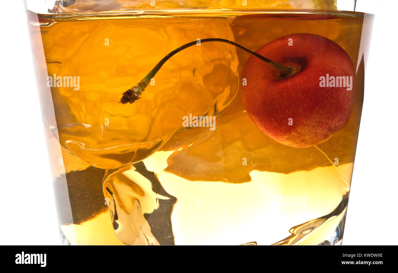 Extreme Close up of an Old Fashioned Mixed Drink on a White Background