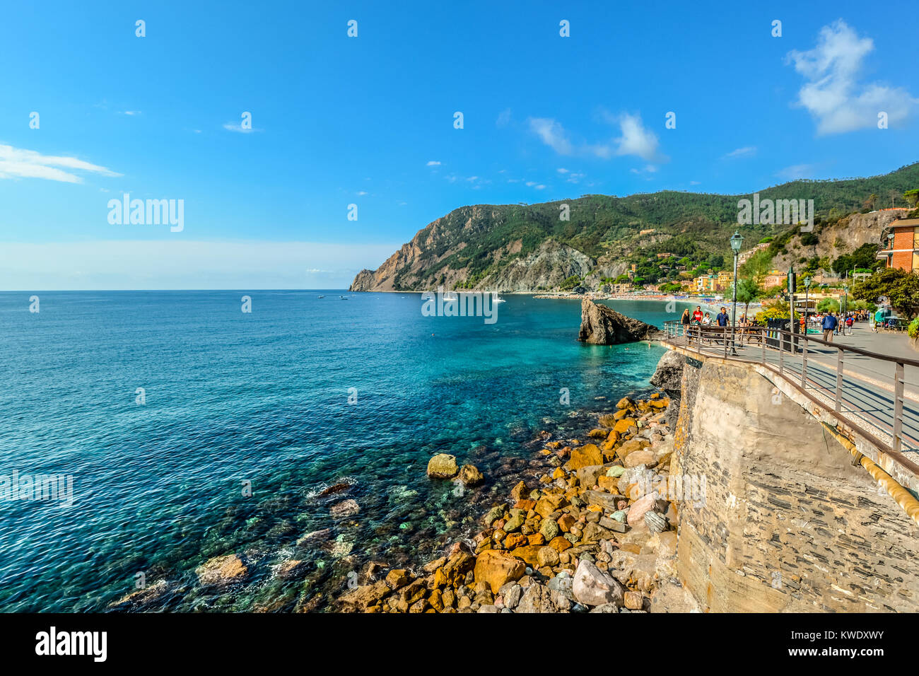 Colorful Ligurian sea at the coast of Spiaggia di Fegina, the beach at Monterosso al Mare in Cinque Terre Italy Stock Photo