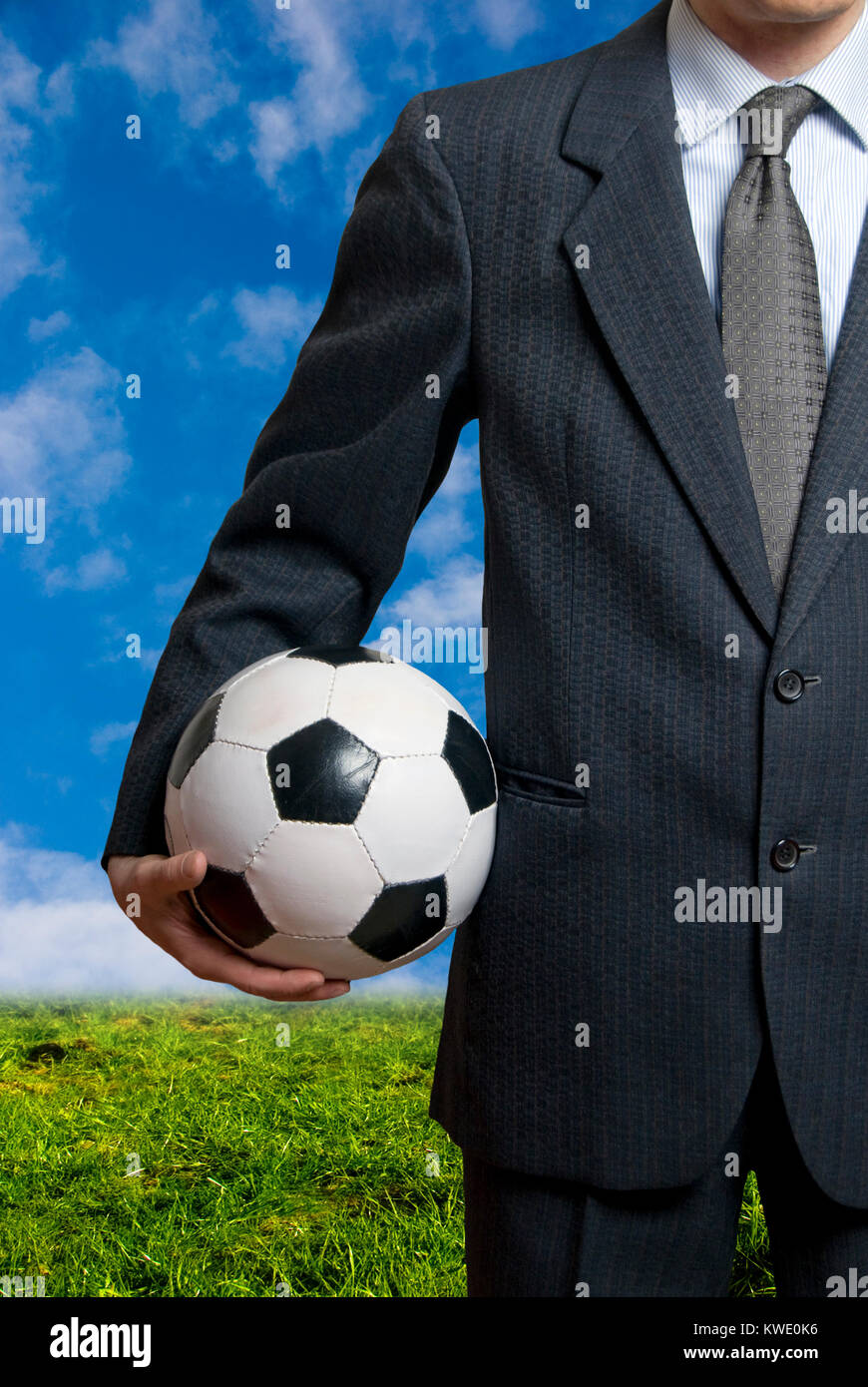 man in suit and a soccer ball, sport as business concept Stock Photo ...