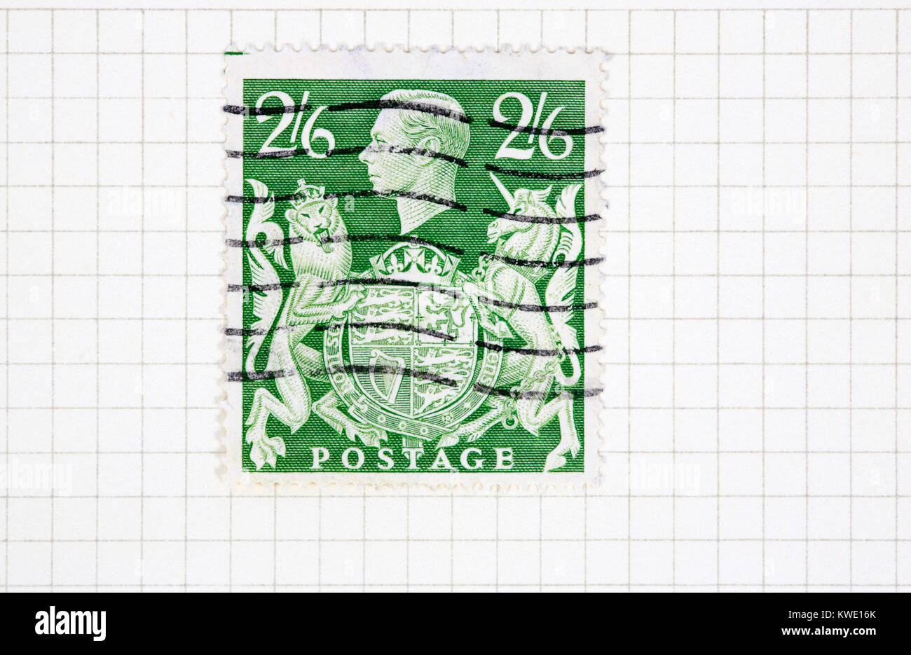 A used King George VI 2s 6d green stamp of 1939-48 issue from a collection of British stamps. Stock Photo