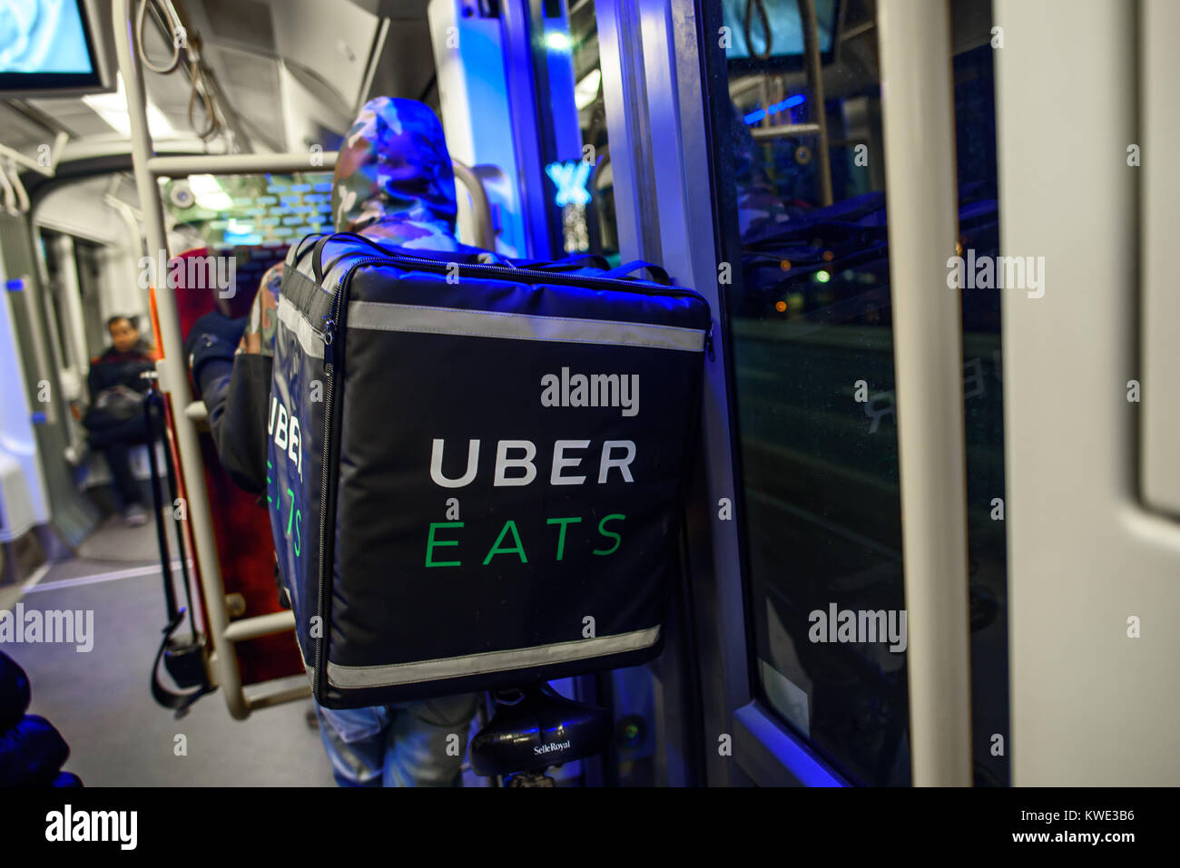 Closeup of Uber Eats backpack. It is online meal delivery platform launched by San Francisco, CA-based ride hailing company Uber Technologies. Stock Photo