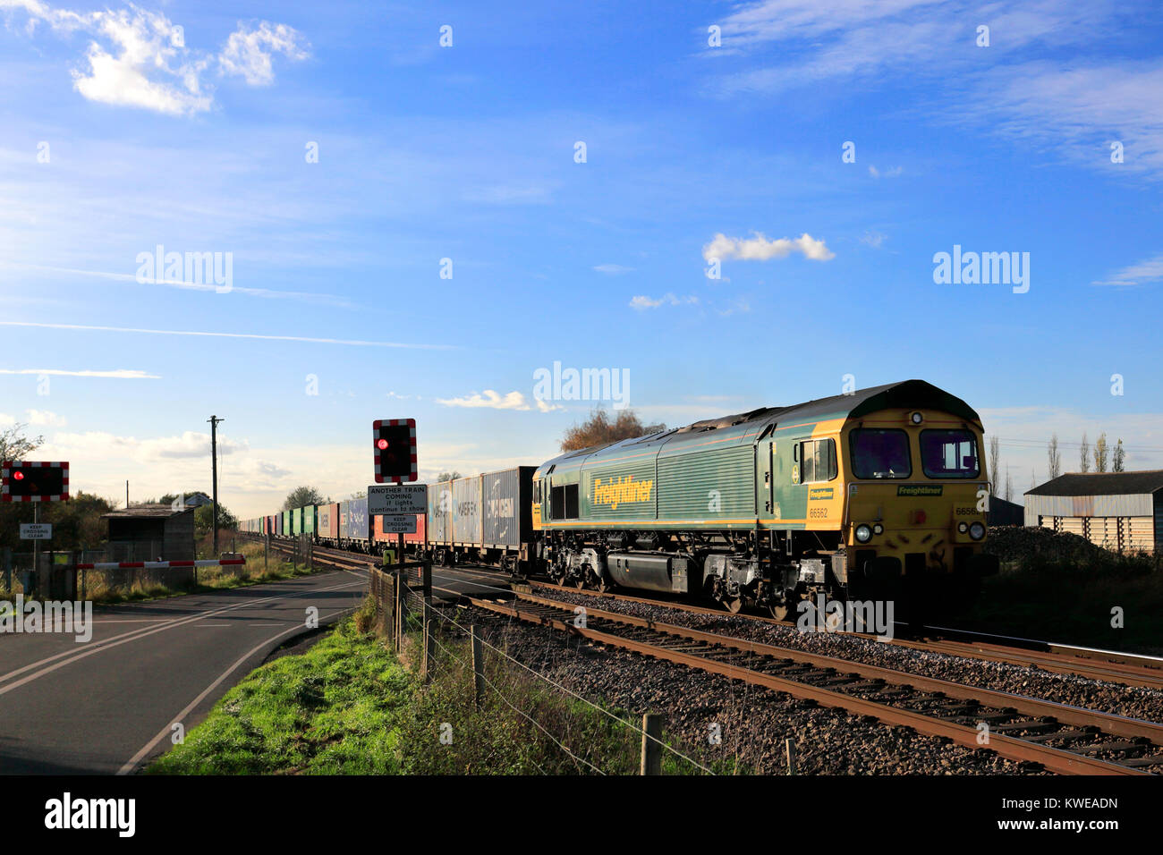 66562 Freightliner train, Peterborough to March line, Cambridgeshire, England, UK Stock Photo