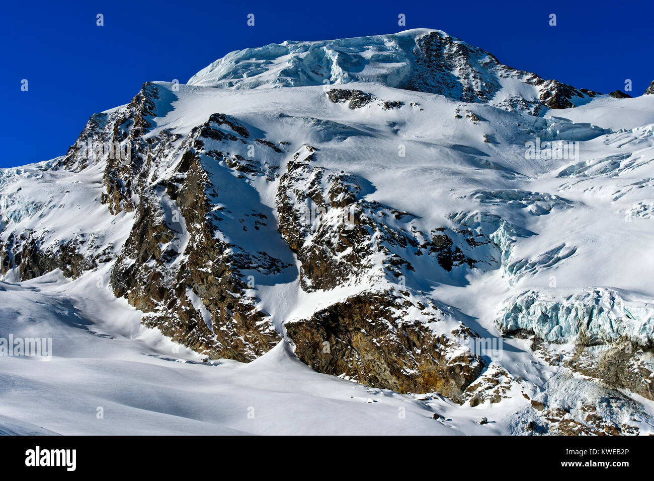 The snowcovered Alphubel mountain, SaasFee, Valais, Switzerland Stock