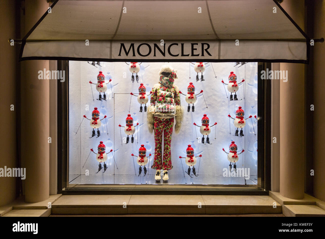 Moncler designer apres ski winter fashion and decorations in a store shop  window, Cannes, France Stock Photo - Alamy