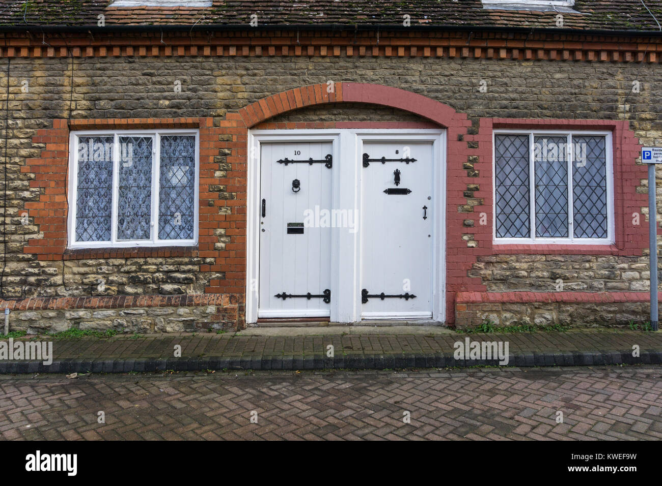 Frontage of part of a terrace of Grade II listed town houses, Stony