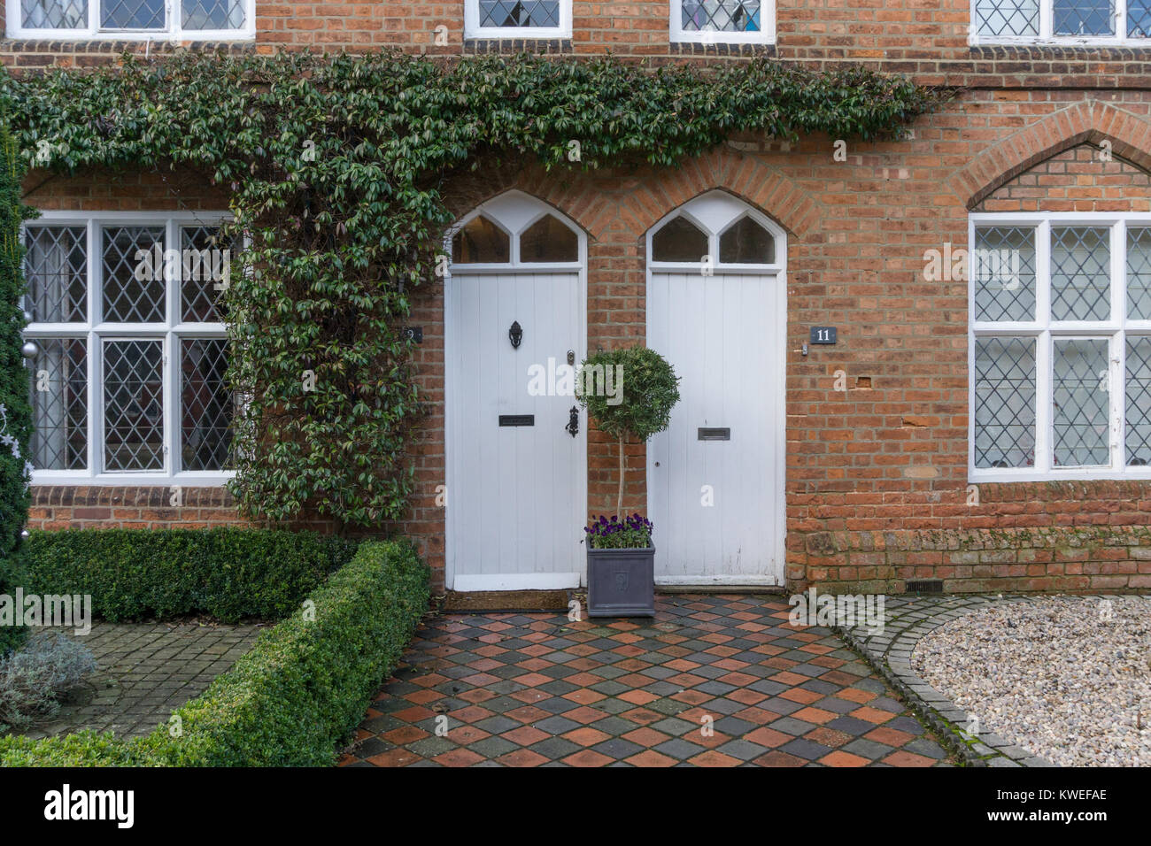Frontage of part of a terrace of Grade II listed town houses, Stony