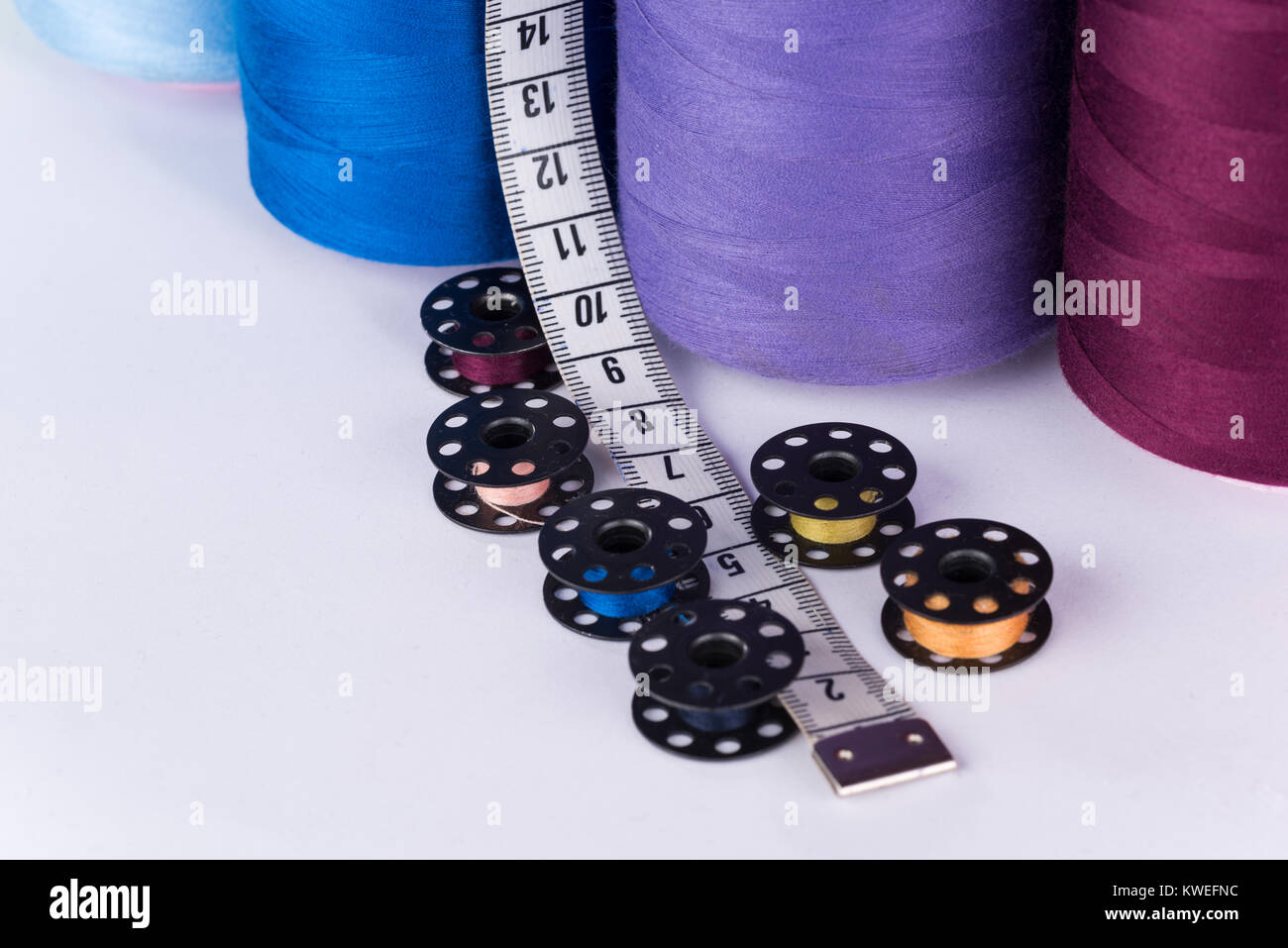 Tailor supplies; yarn coils, mesure and rollers Stock Photo Alamy