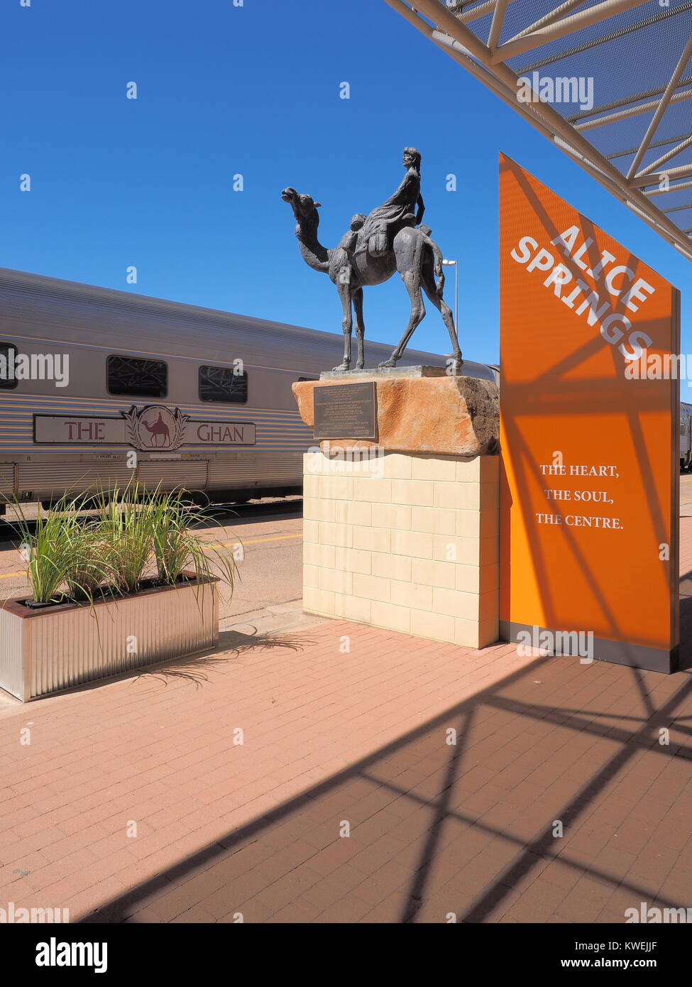 Alice Springs, Australia - September 7, 2017: The famous Ghan railway at the Alice Springs terminal with a local sign Stock Photo