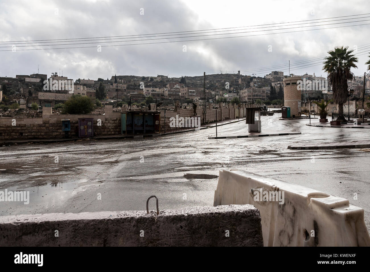 Hebron, Palestine, January 8 2011: Abandoned Shuhada street in Hebron and Israeli check point. It used to be a main street of Hebron, it is now closed Stock Photo