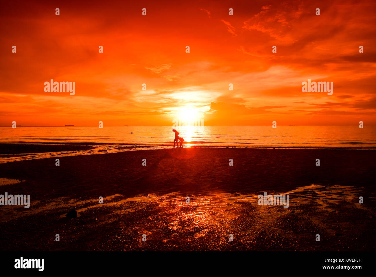Many things in life can wait, but the sunset won’t, watch it. Stock Photo
