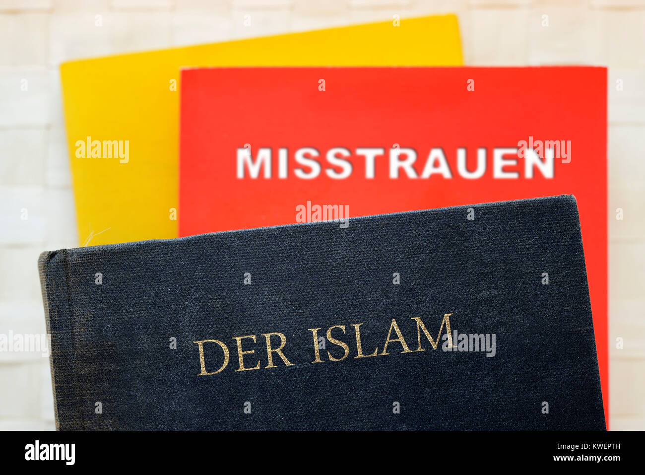 Books in German national colours, Islam and mistrust, Islam fear, B?cher in deutschen Nationalfarben, der Islam und Misstrauen, Islam-Angst, Buecher i Stock Photo