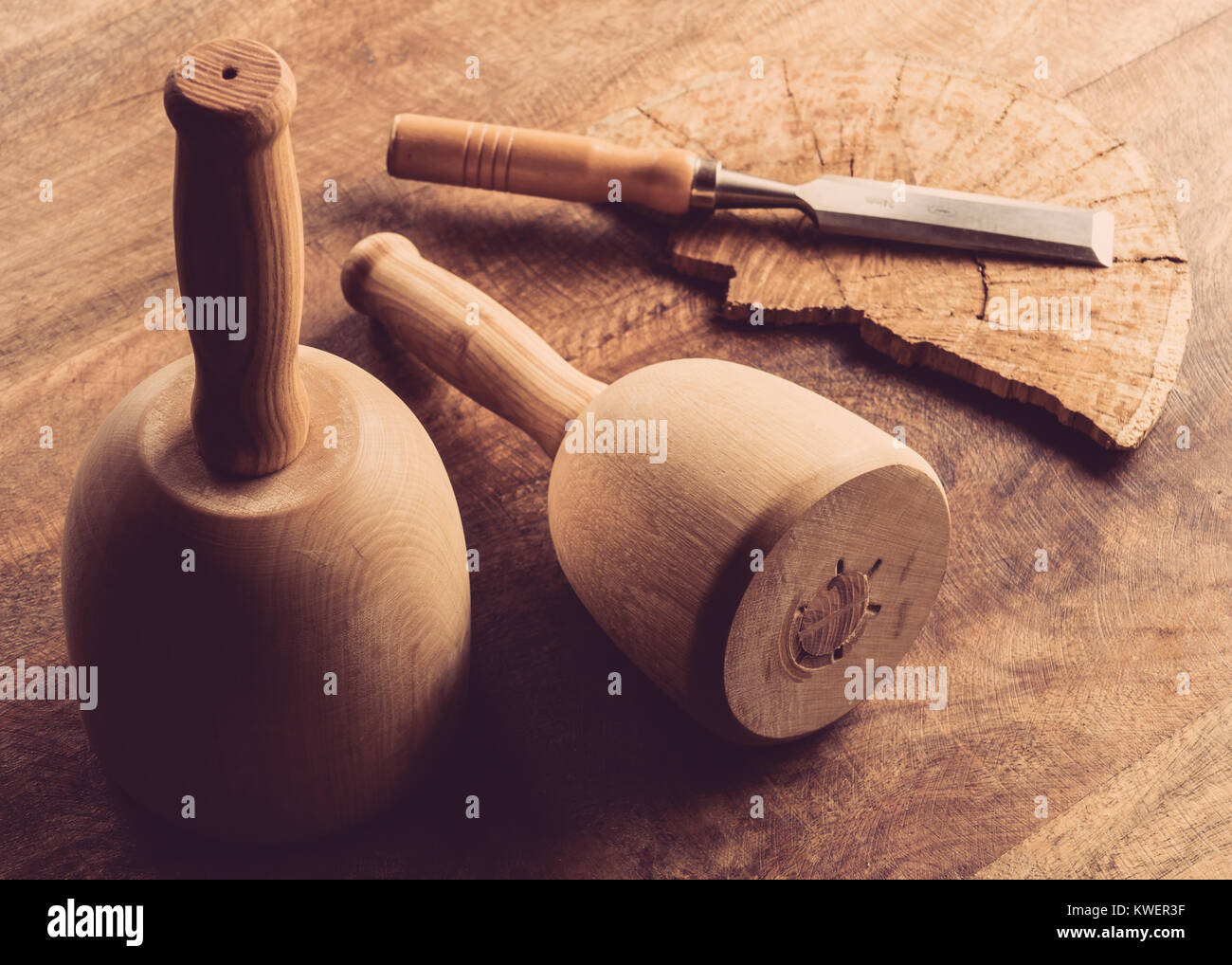 Still life of carving tools on wooden table Stock Photo